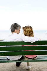 Image showing Mature romantic couple on a bench