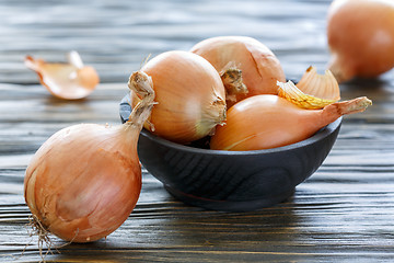 Image showing Yellow onion in the husk.