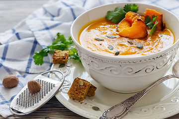 Image showing Pumpkin soup with chunks of baked pumpkin and spices.