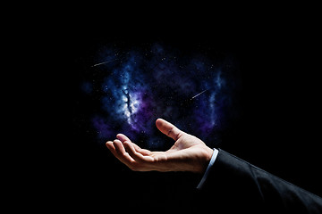 Image showing close up of businessman hand over space background