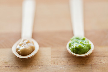 Image showing vegetable or fruit puree or baby food in spoons