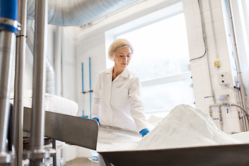 Image showing woman working at ice cream factory conveyor