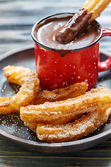 Image showing Churros with hot chocolate.