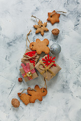 Image showing Christmas gingerbread and gifts with festive decor.