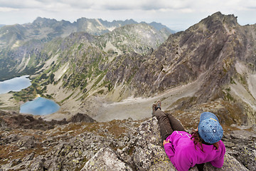 Image showing Hiking woman admiring the beauty of rocky Tatra mountains