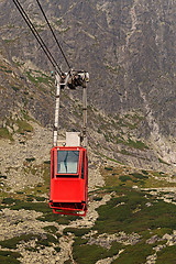 Image showing Wagon cable car against the background of beautiful rocky mountains