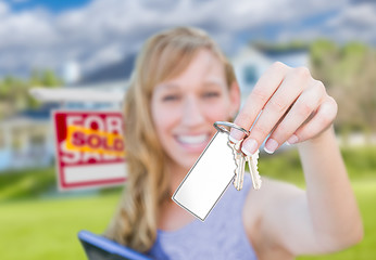 Image showing Woman Holding New House Keys with Blank Card In Front of Sold Re