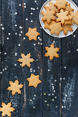 Image showing Gingerbread in the shape of stars and snowflakes.