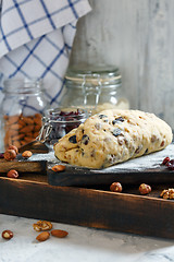 Image showing Christmas Stollen on a floured Board.