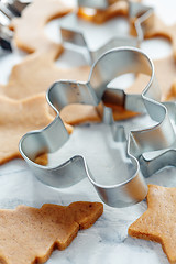 Image showing Metal cookie cutters for Christmas cookies.