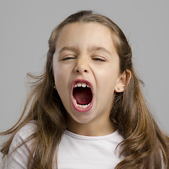 Image showing Little girl with open mouth