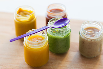 Image showing vegetable or fruit puree or baby food in jars