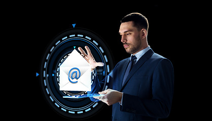 Image showing businessman with tablet pc and e-mail hologram