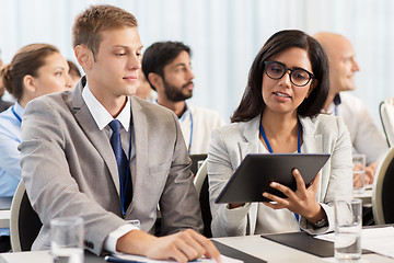 Image showing team with tablet pc at business conference