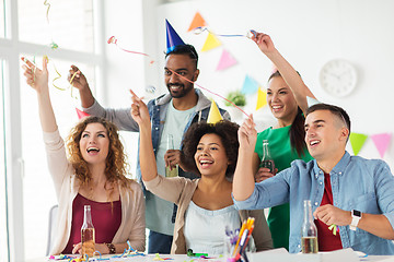 Image showing happy team with confetti at office birthday party