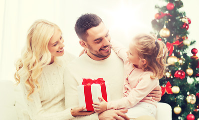 Image showing happy family at home with christmas tree