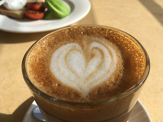 Image showing Coffee latte served in a glass