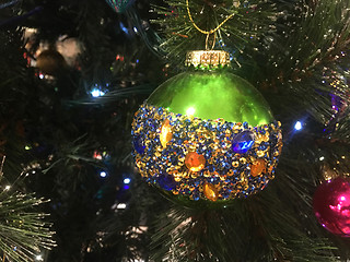 Image showing Green Christmas tree bauble embellished with amber blue and gold