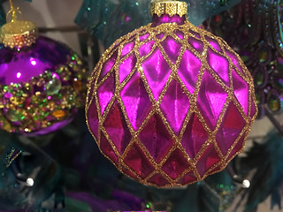 Image showing Gold and fuchsia Christmas tree baubles ornaments