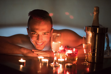 Image showing man relaxing in the jacuzzi