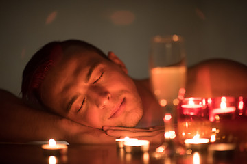 Image showing man relaxing in the jacuzzi