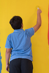 Image showing Portrait of a happy young boy painter