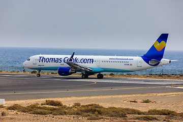 Image showing ARECIFE, SPAIN - APRIL, 16 2017: AirBus A321 of ThomasCook.com w