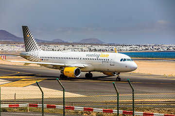 Image showing ARECIFE, SPAIN - APRIL, 15 2017: AirBus A320 of vueling.com with