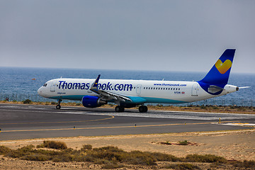 Image showing ARECIFE, SPAIN - APRIL, 16 2017: AirBus A321 of ThomasCook.com w