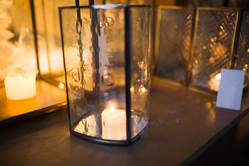 Image showing close up of lantern with candle burning inside