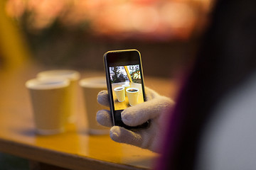 Image showing mulled wine picture on smartphone at christmas