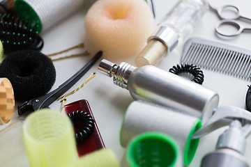 Image showing hair styling sprays, curlers and pins