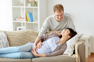 Image showing happy pregnant wife with husband at home