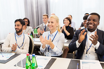 Image showing people applauding at business conference