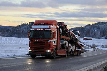 Image showing Scania Car Carrier Trucking at Winter Dusk