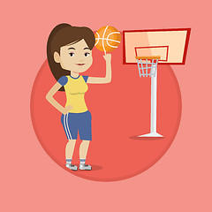 Image showing Young basketball player spinning ball.