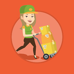 Image showing Delivery postman with cardboard boxes on trolley.