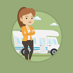 Image showing Woman standing in front of motor home.