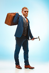 Image showing The barded man in a suit holding cane.