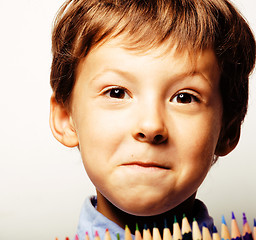 Image showing little cute boy with color pencils close up smiling, education f