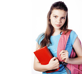 Image showing young cute teenage girl posing cheerful against white background with books and backpack isolated, lifestyle people concept