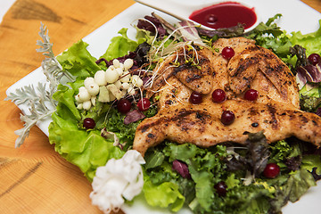 Image showing quail roasted with sweet and sour cranberry sauce