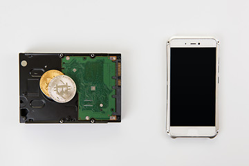 Image showing Bitcoin coin with HDD