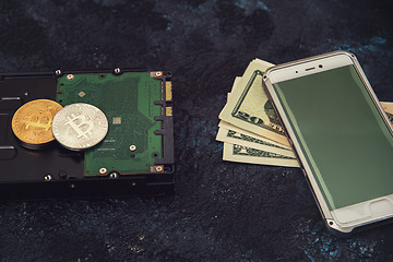 Image showing Bitcoin coin with HDD