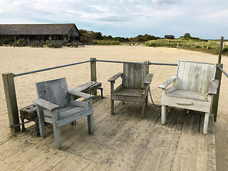 Image showing Rustic Chairs at Beach Setting