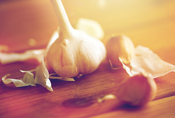 Image showing close up of garlic on wooden table