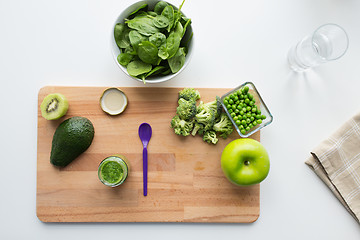 Image showing vegetable puree or baby food and fruits on board