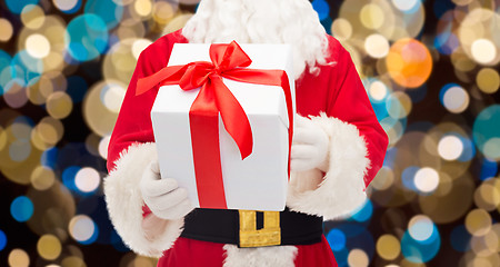 Image showing close up of santa claus with christmas gift