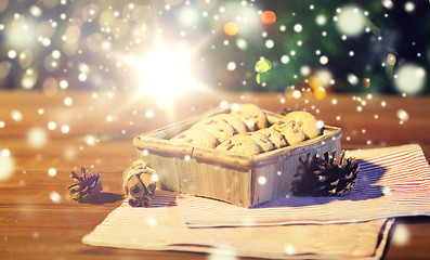 Image showing close up of christmas oat cookies on wooden table