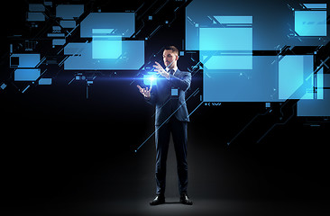 Image showing businessman working with virtual screen